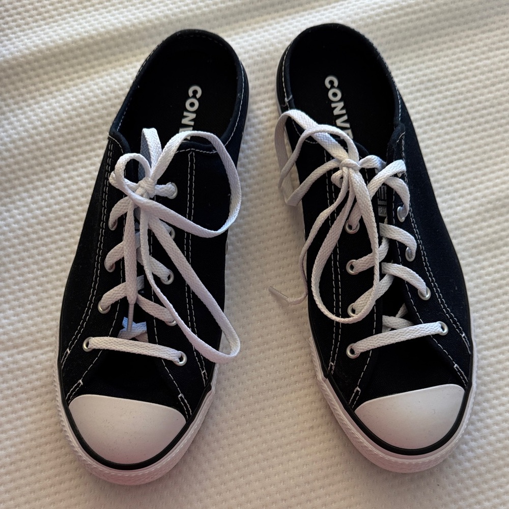 Converse Black Low-Top Canvas Slip on Sneakers with White Laces..